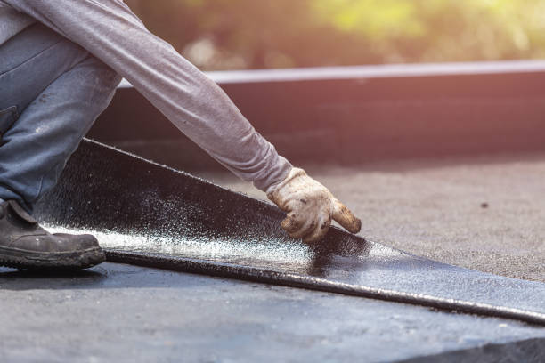 Professional Waterproofing technician working in Bellmawr, NJ